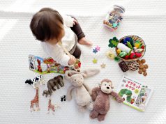 1 year old with toys